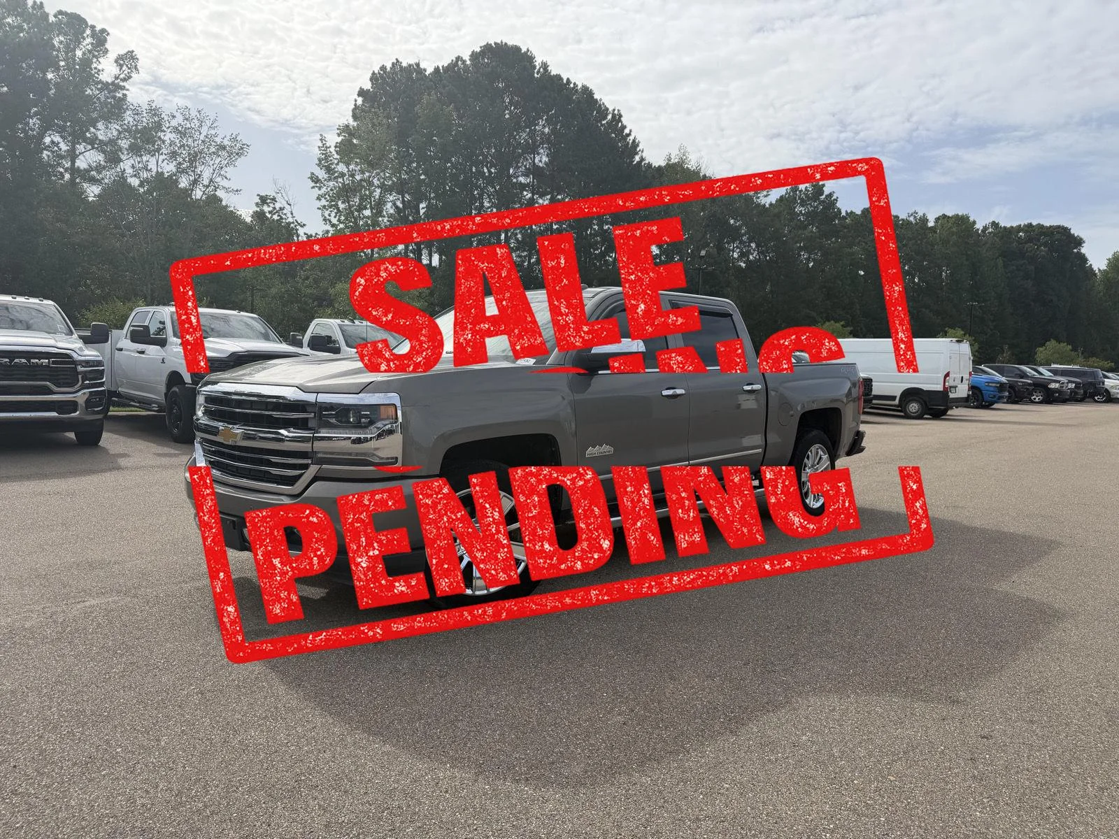 Used 2017 Pepperdust Metallic Chevrolet High Country image 1