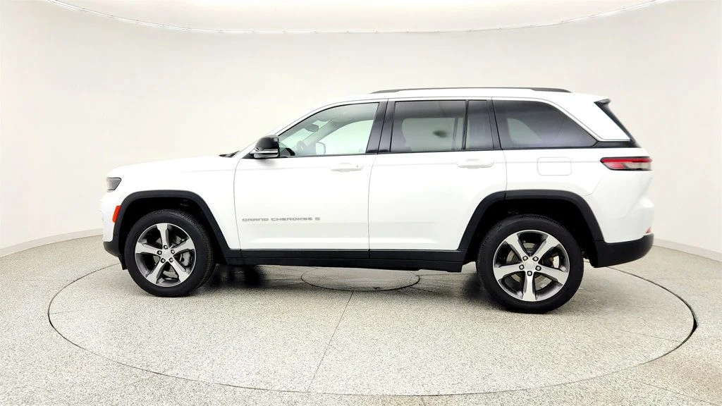 Used 2023 Bright White Clearcoat Jeep Limited 4x4 w/ 20
