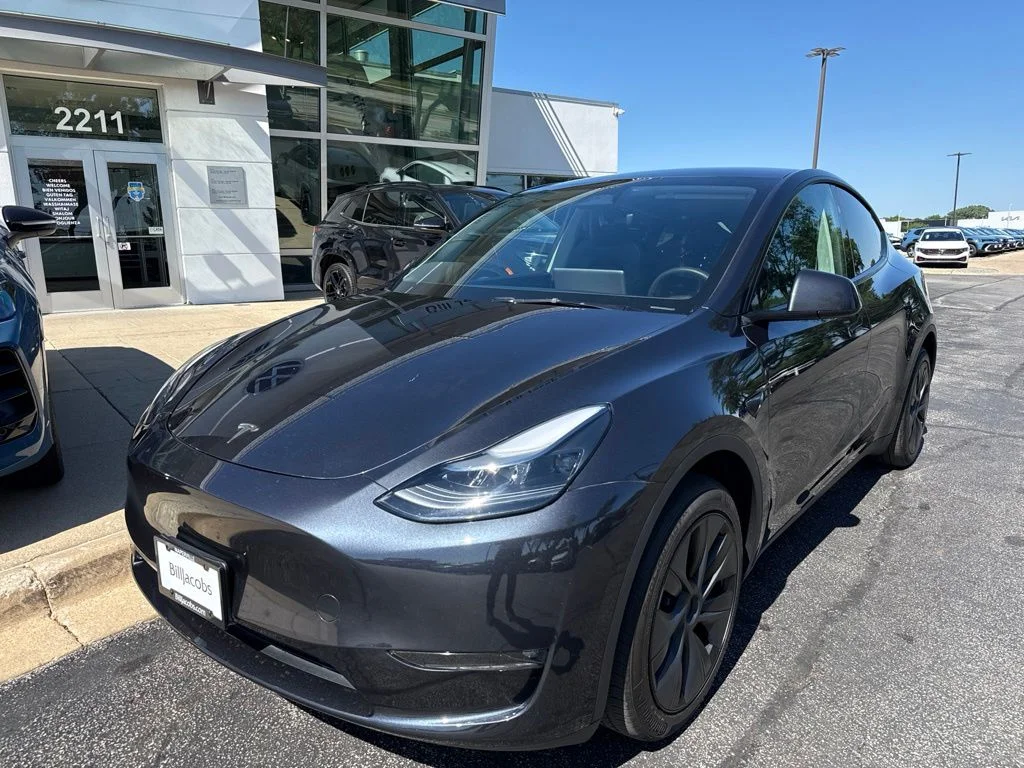 Used 2025 Tesla Model Y Long Range with VIN 7SAYGDEE9SF224580 for sale in Naperville, IL