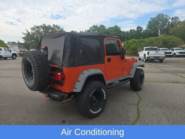 Used 2005 Impact Orange Cle Jeep Sport image 15