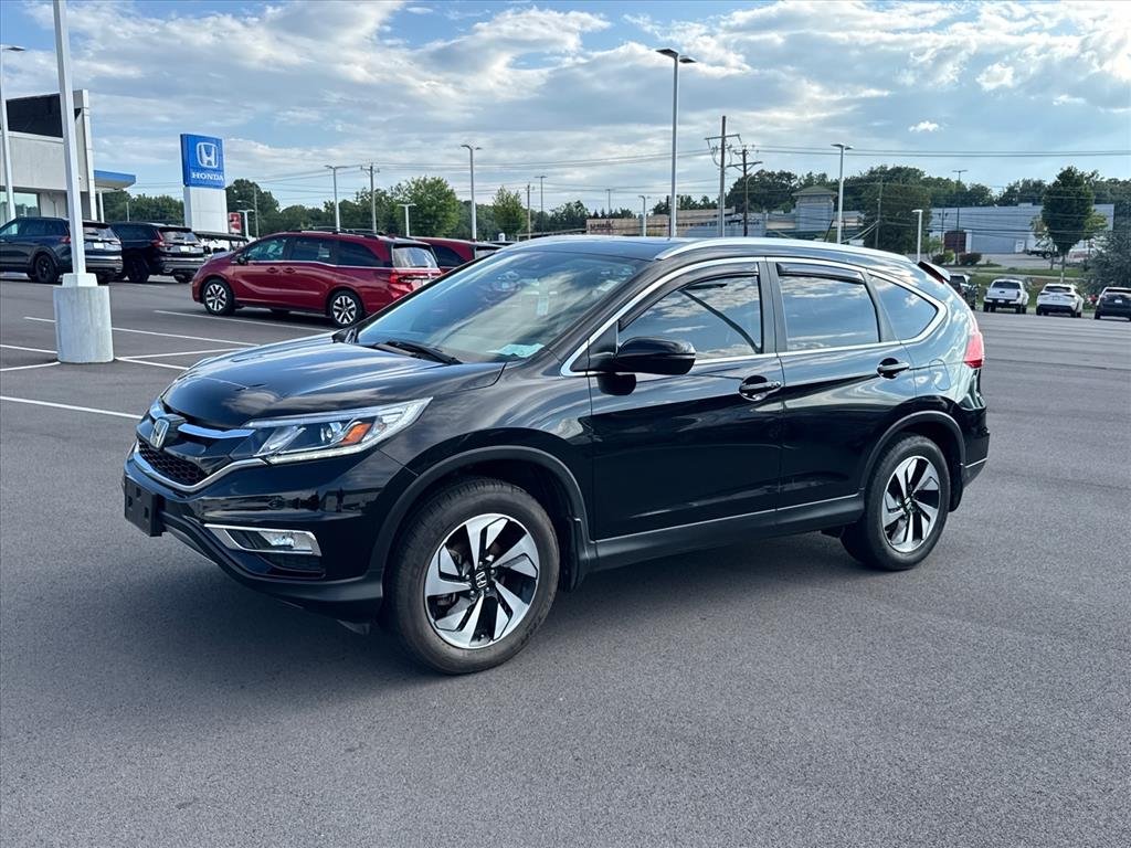 Used 2016 Crystal Black Pearl Honda Touring image 1