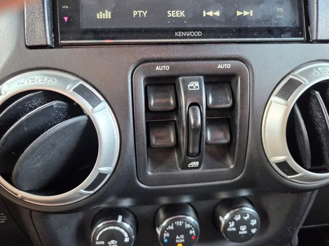 Used 2015 Red Jeep Unlimited Sahara image 24