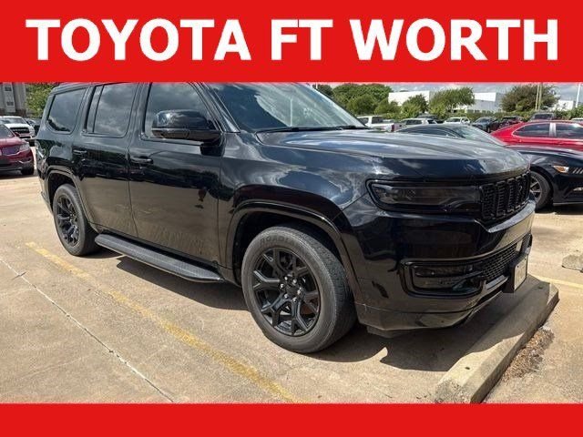 Used 2024 Black Jeep Series II image 1