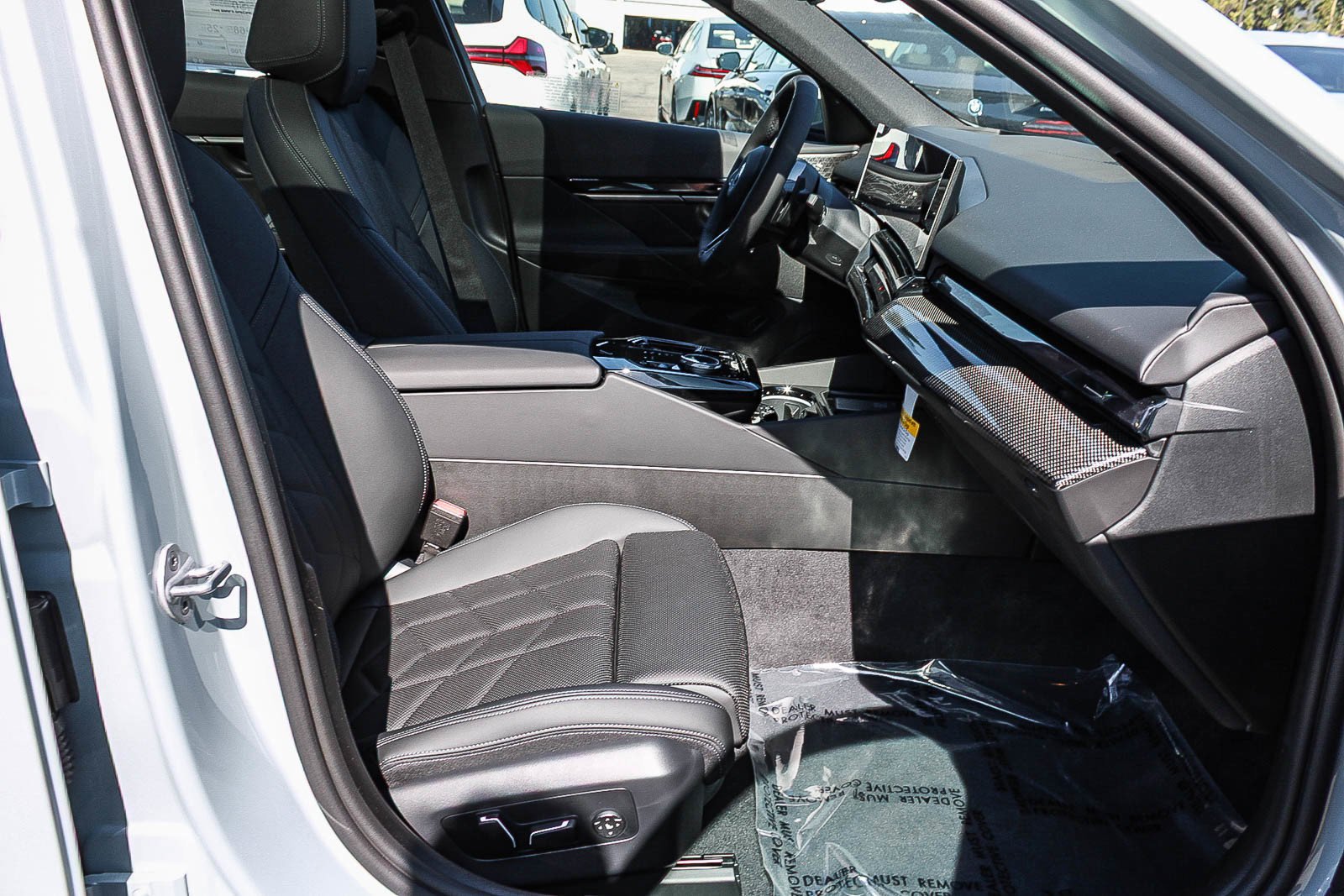 New 2027 Brooklyn Grey Metallic BMW 550e xDrive image 14