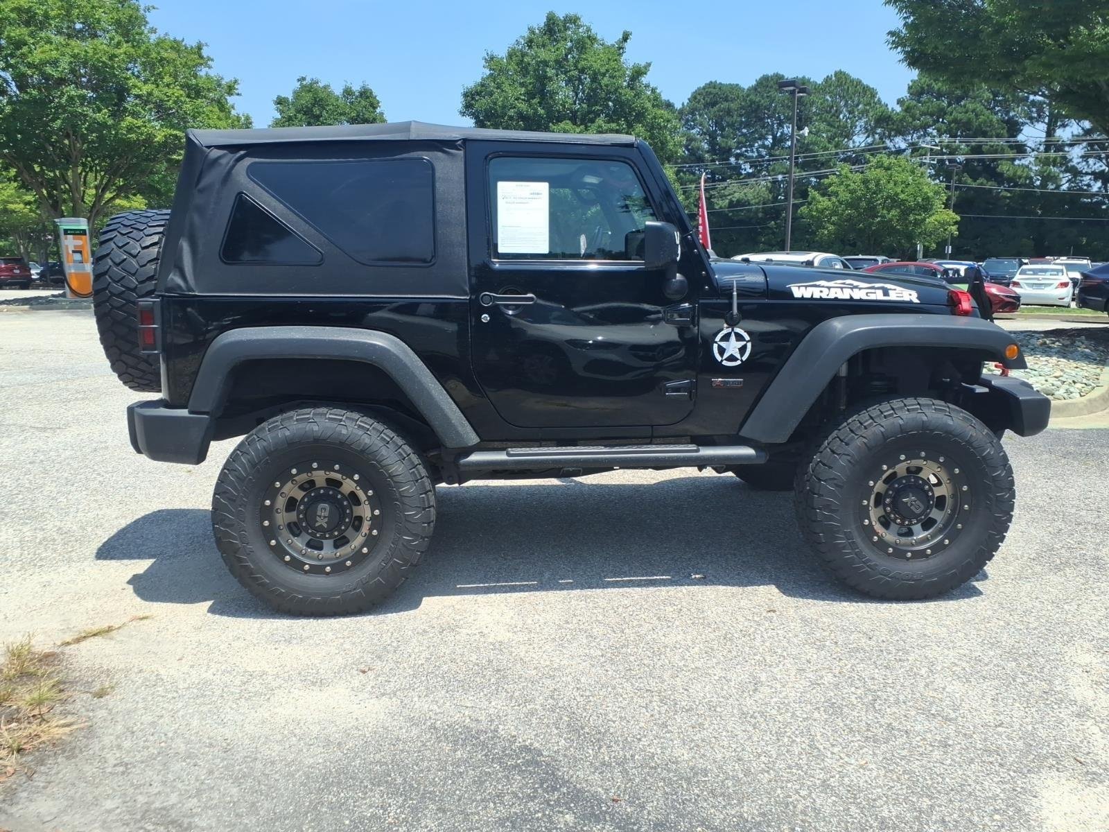 Used 2017 Black Clearcoat Jeep Sport image 5