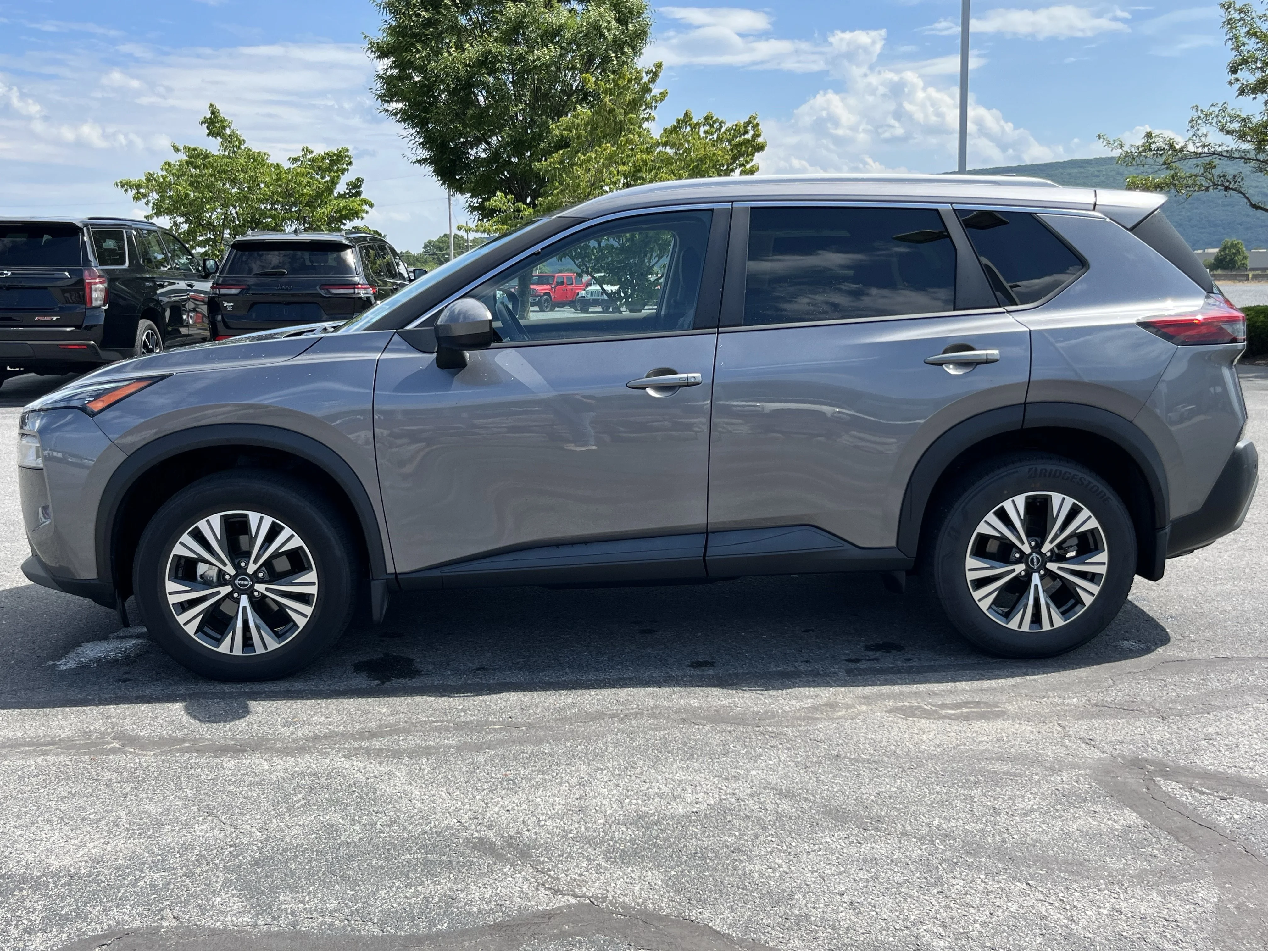Used 2023 Gun Metallic Nissan SV image 10