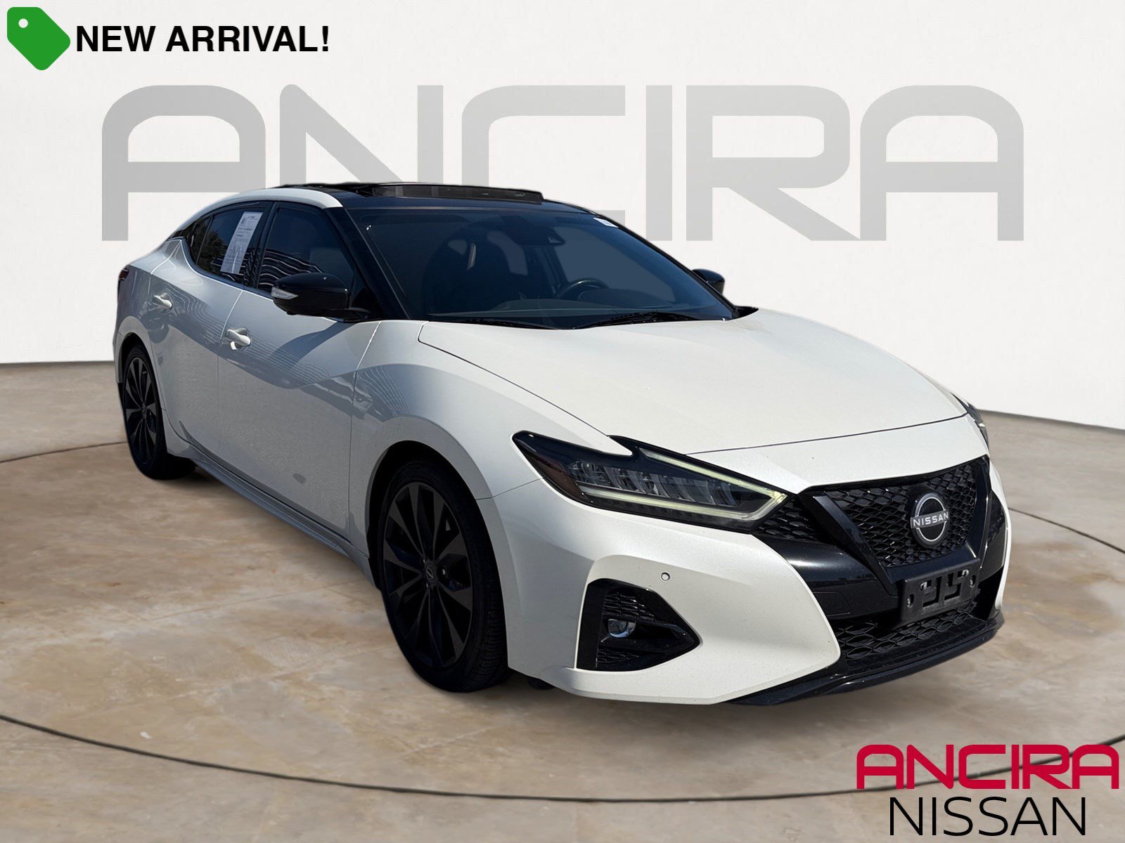 Used 2023 Pearl White Tricoat Nissan SR image 1