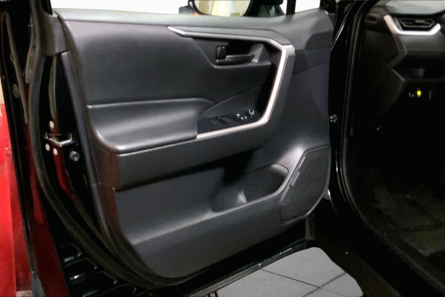 Used 2025 Midnight Black Metallic Toyota Hybrid LE image 22