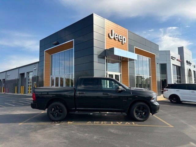 Used 2019 Brilliant Black Crystal Pearlcoat Ram SLT image 1