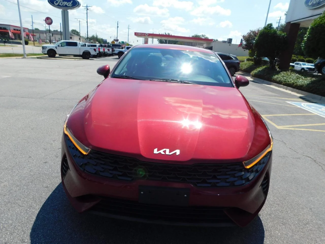 Used 2023 Burgundy Kia LXS AUTO FWD image 3