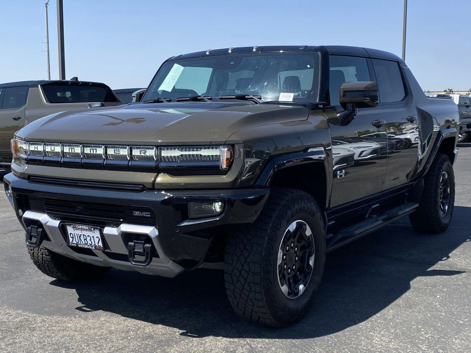 New 2025 Deep Aurora Metallic (Dark Bronze) GMC 3X image 3