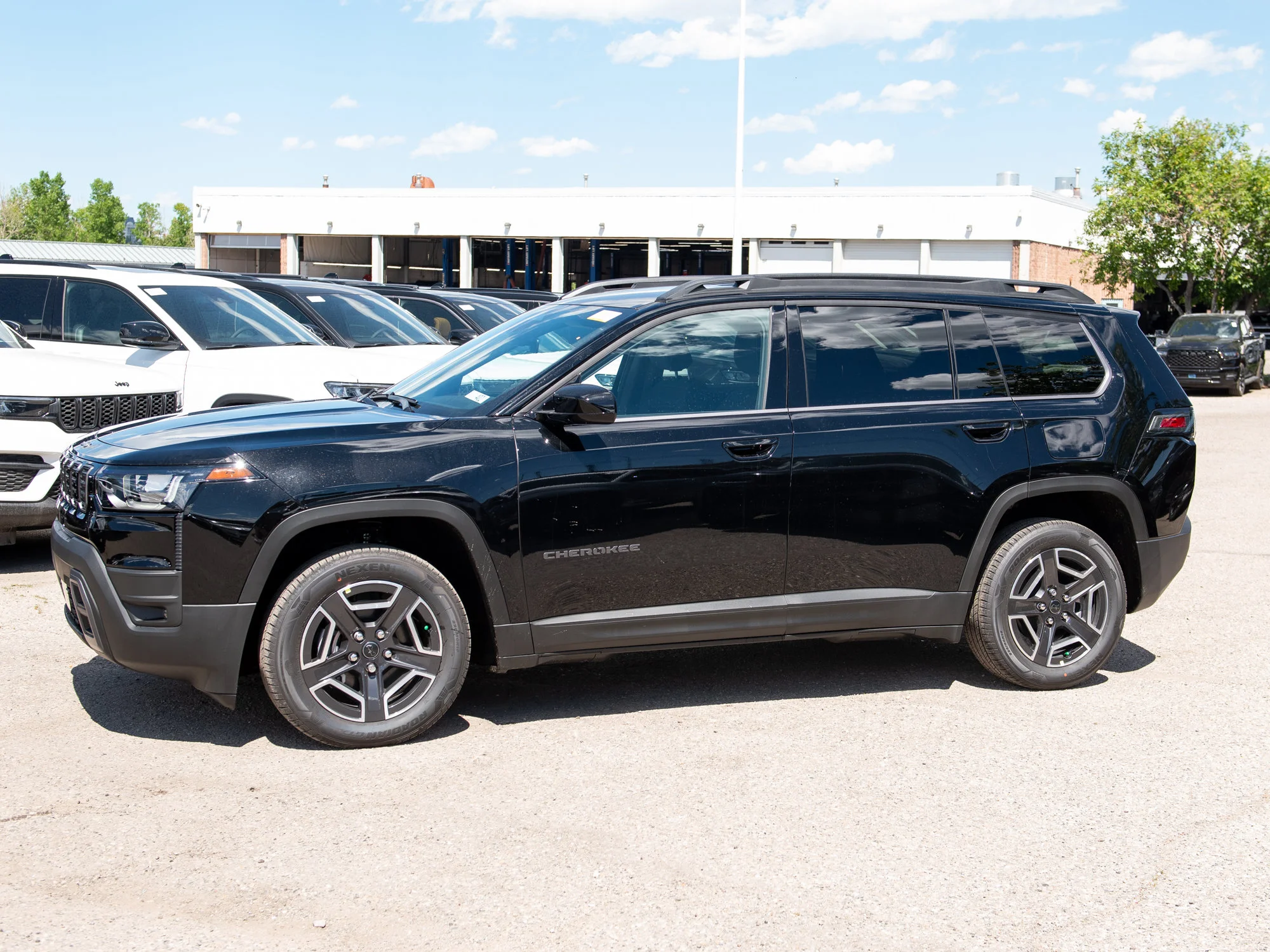 New 2026 Black Jeep Laredo * Hybrid image 2