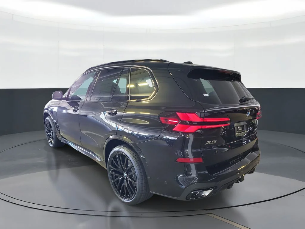 Used 2026 Black Sapphire Metallic BMW sDrive40i image 4