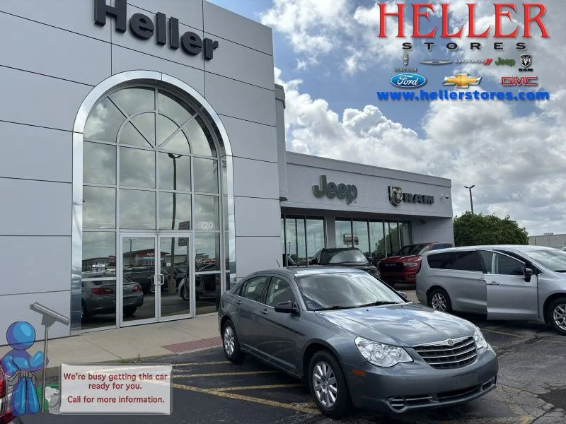 Used 2010 Silver Steel Metallic Clearcoat/Black Vinyl Top Chrysler Touring image 1