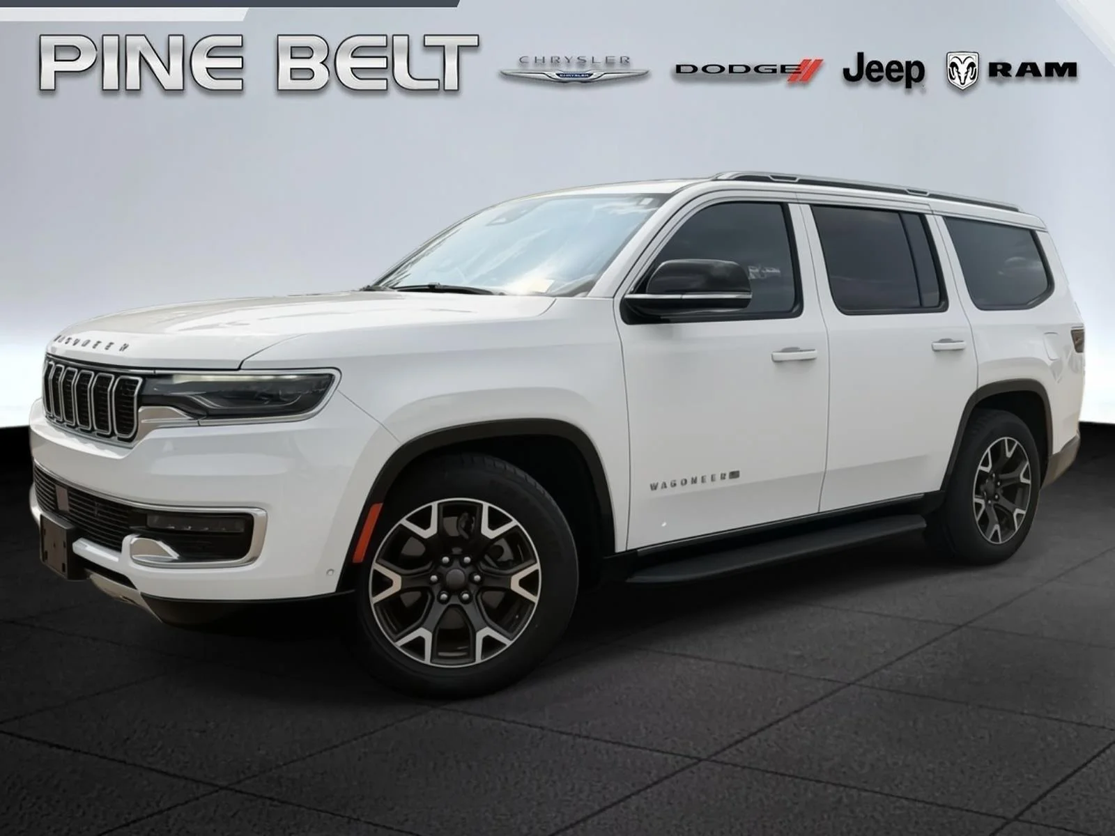 Used 2023 Bright White Clearcoat Jeep Series III image 1