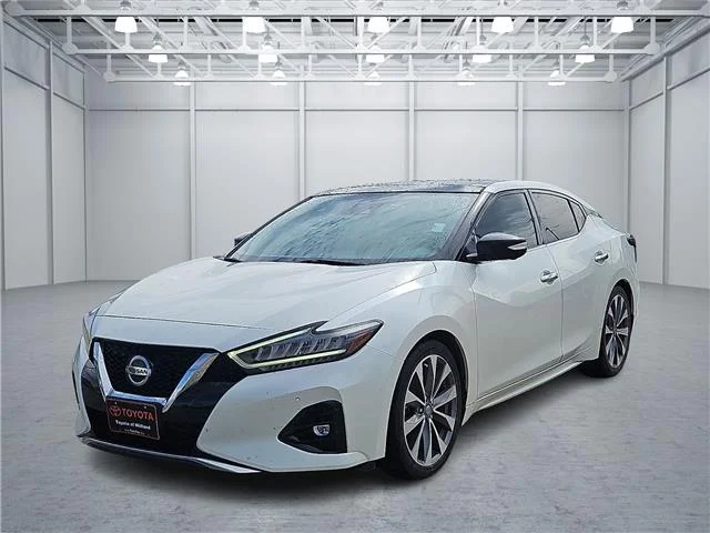 Used 2022 Pearl White Tricoat Nissan Platinum image 1