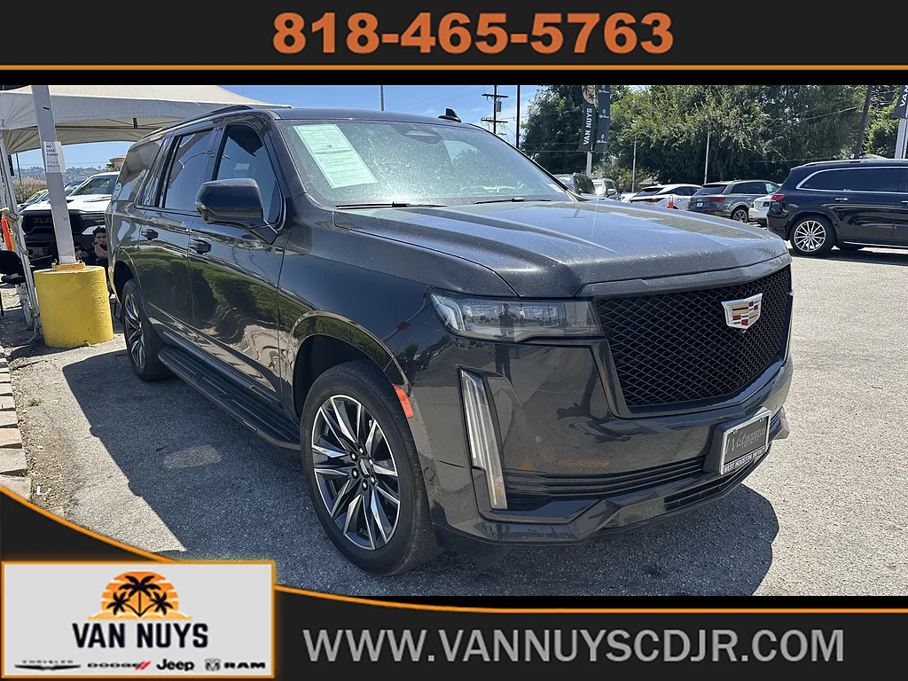 Used 2023 Black Raven Cadillac Sport image 1