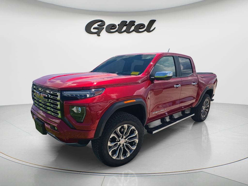 Used 2026 Volcanic Red Tintcoat GMC Denali image 1