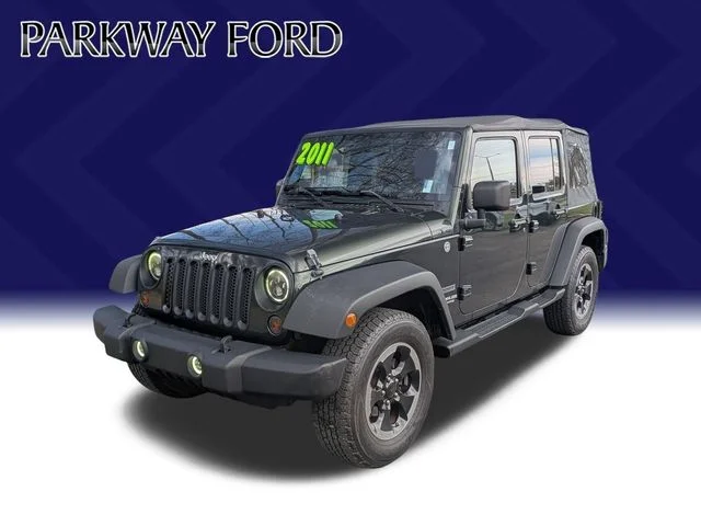 Used 2011 Green Jeep Unlimited Sport image 2