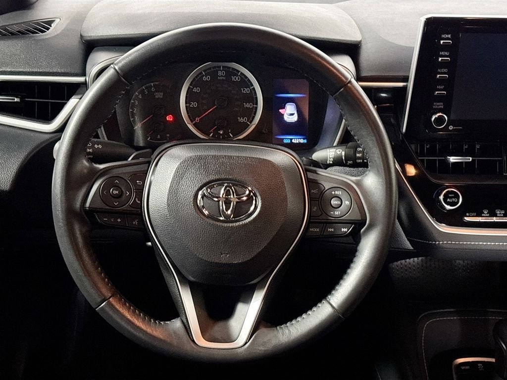 Used 2022 Midnight Black Metallic Toyota SE image 13