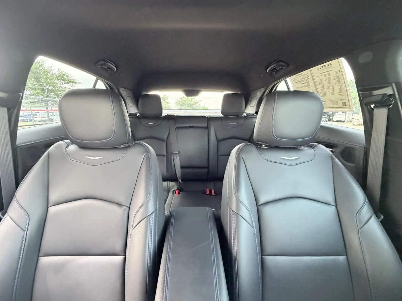 Used 2024 Stellar Black Metallic Cadillac Sport image 16