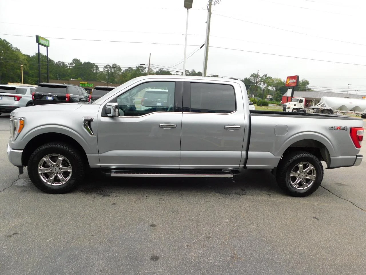 Used 2023 Iconic Silver Metallic Ford LARIAT 4WD SUPERCREW 6.5 ft image 5