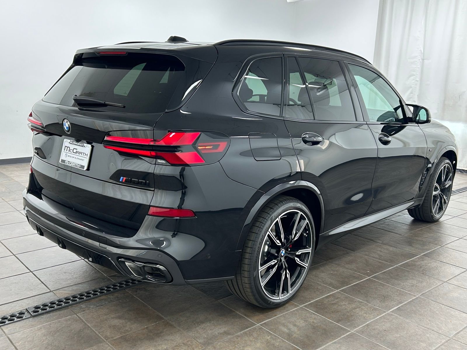 New 2026 Black Sapphire Metallic BMW M60i image 5