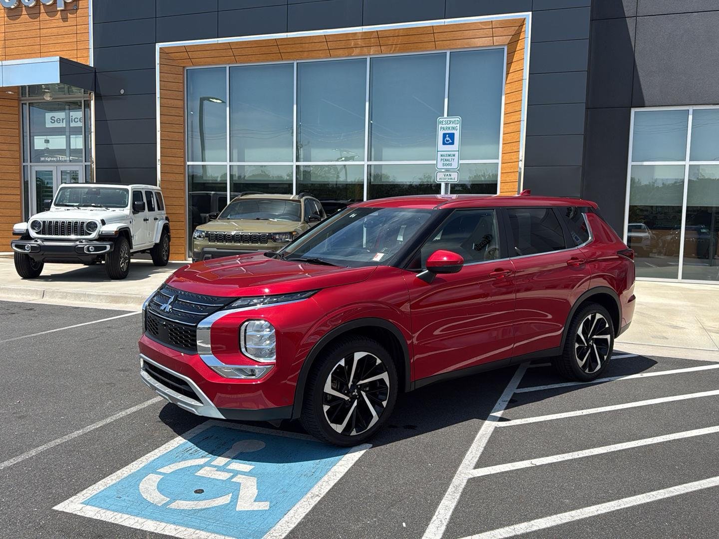 Used 2024 Red Diamond Mitsubishi SE image 2