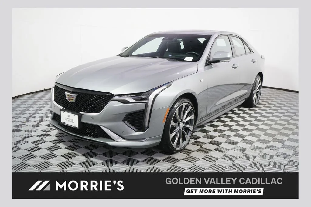 Used 2023 Argent Silver Metallic Cadillac Sport image 1