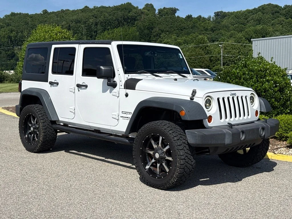 Used 2013 Bright White Jeep Unlimited Sport image 8