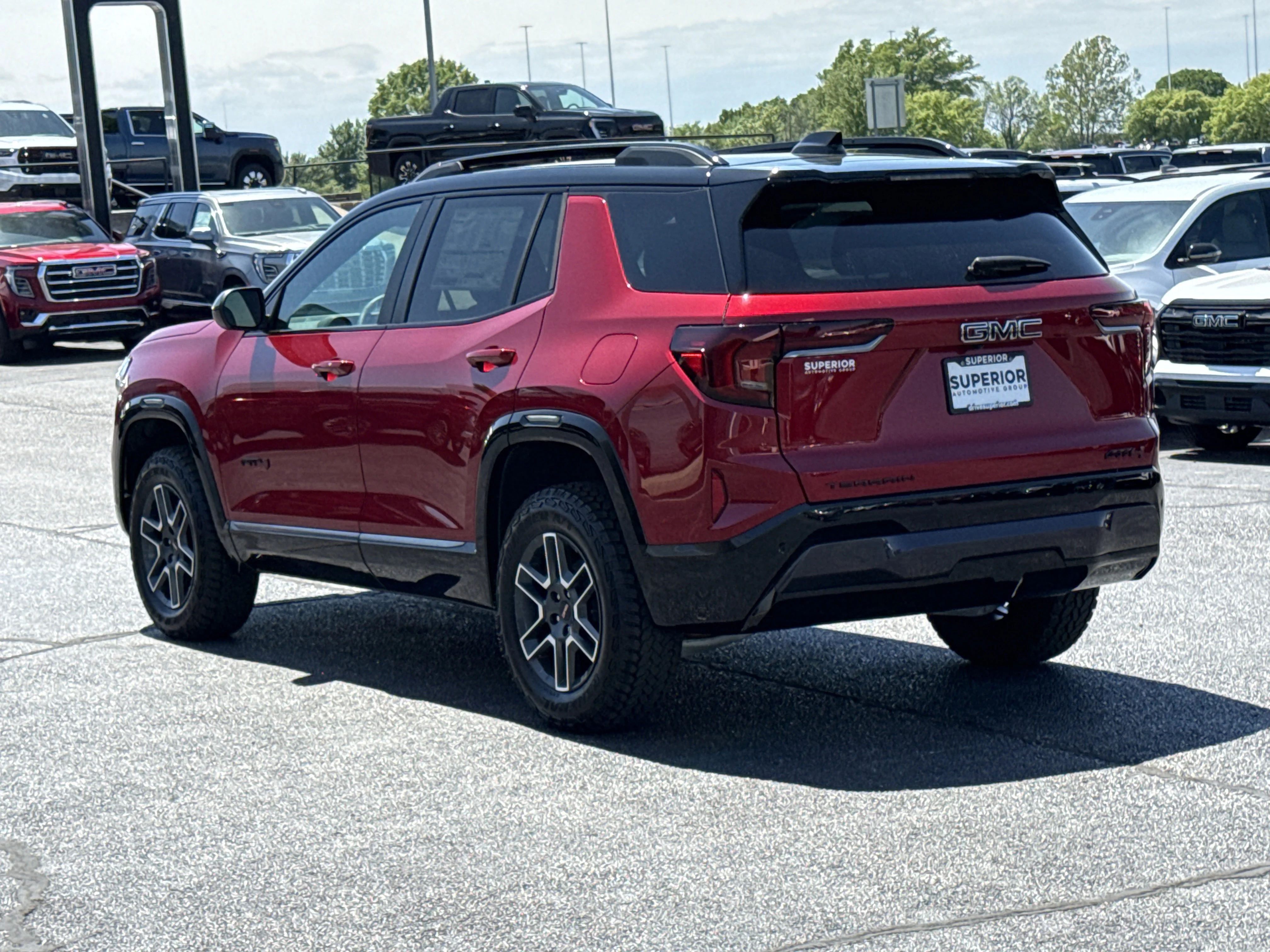 New 2026 Volcanic Red Tintcoat GMC AWD AT4 image 11