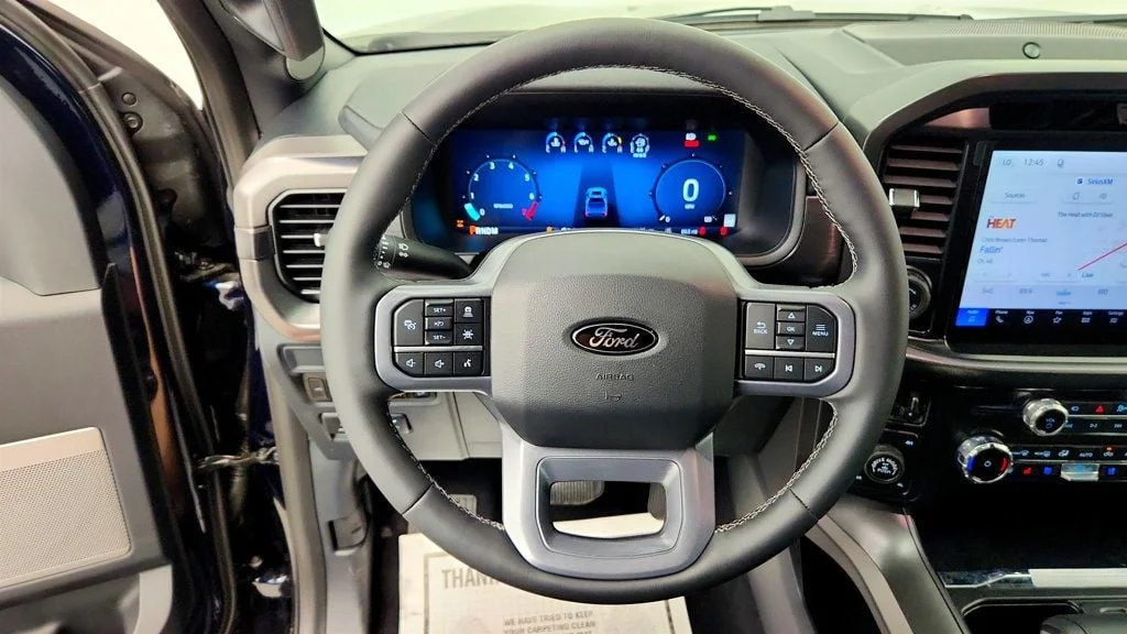 Used 2026 Antimatter Blue Metallic Ford LARIAT 4WD SuperCrew 6.5