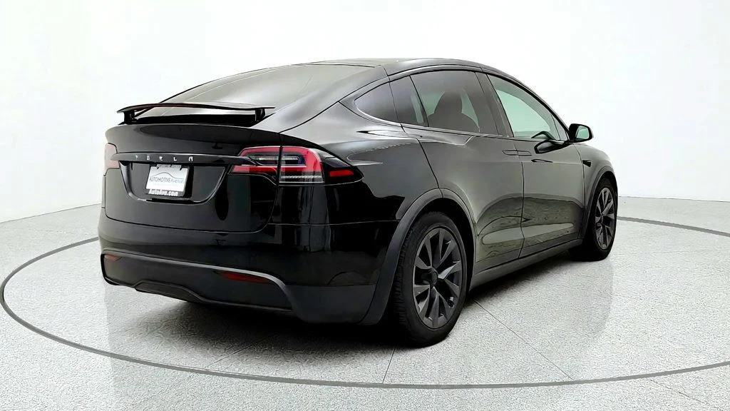 Used 2023 Solid Black Tesla AWD image 5