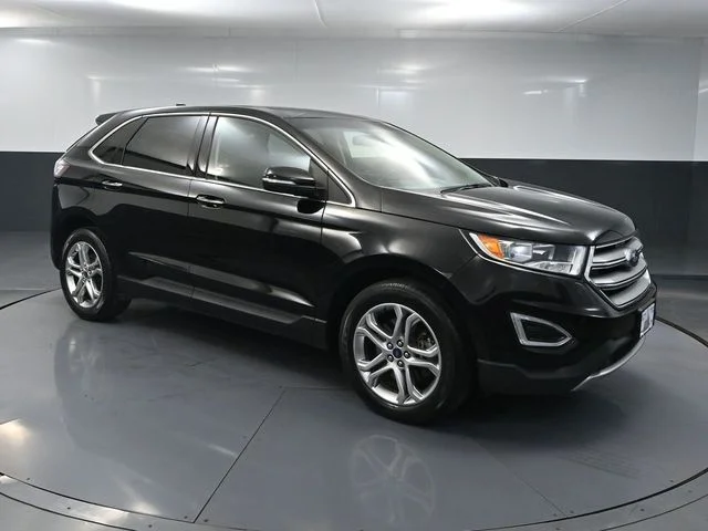 Used 2016 Black Ford Titanium image 1