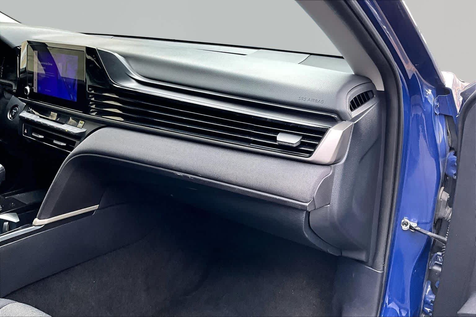 Used 2025 Reservoir Blue Toyota LE image 19