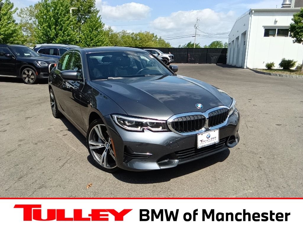 Used 2022 Mineral Grey Metallic BMW 330i xDrive image 1