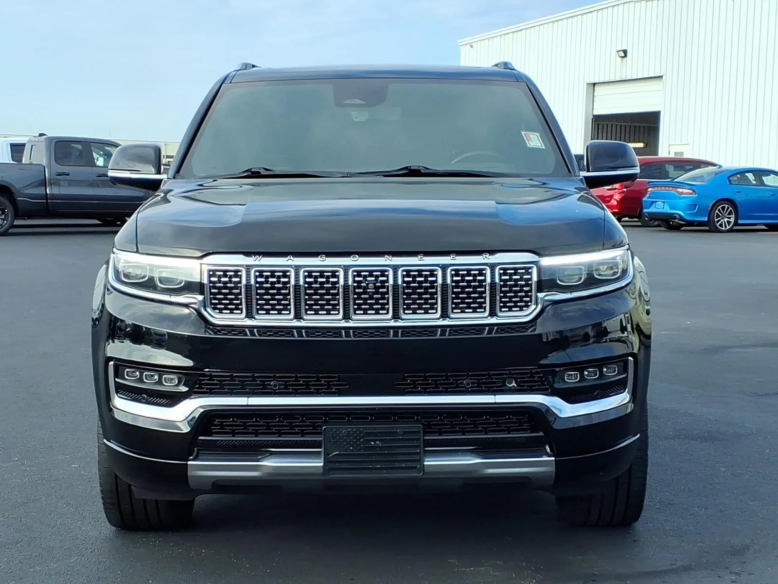 Used 2023 Diamond Black Crystal Pearl Coat Jeep Series III image 19
