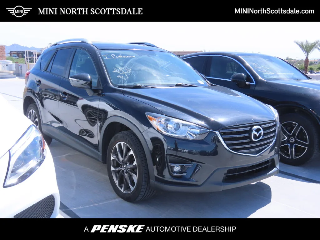 Used 2016 Black Mazda Grand Touring image 1
