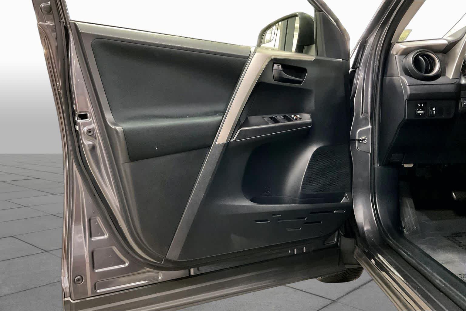 Used 2016 Magnetic Gray Metallic Toyota LE image 21