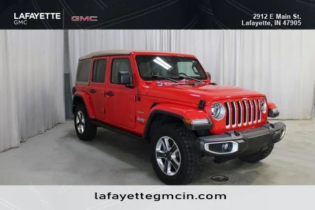 Used 2020 Red Jeep Unlimited Sahara image 1