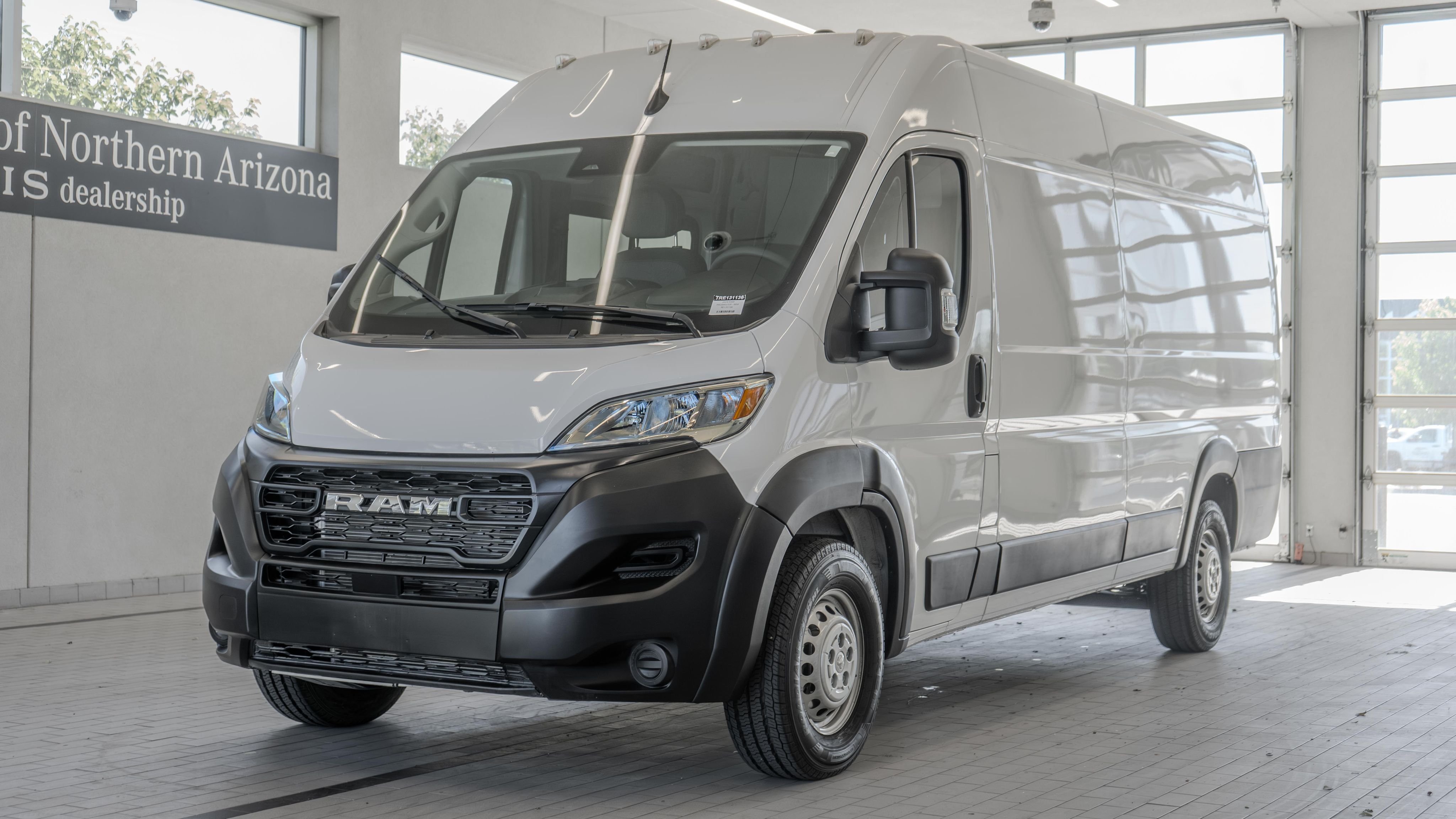 Used 2024 Bright White Clearcoat Ram High Roof image 23