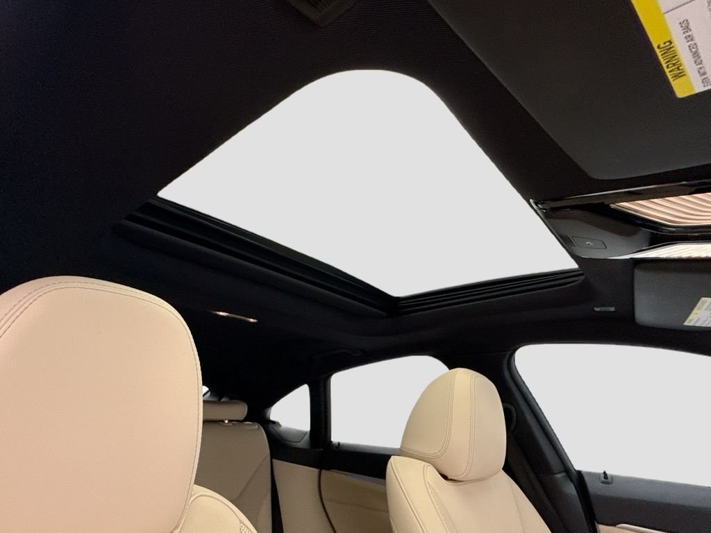 Certified Used 2023 White Metallic BMW eDrive40 image 17