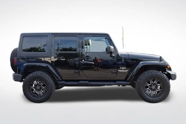 Used 2017 Black Jeep Unlimited Sahara image 12
