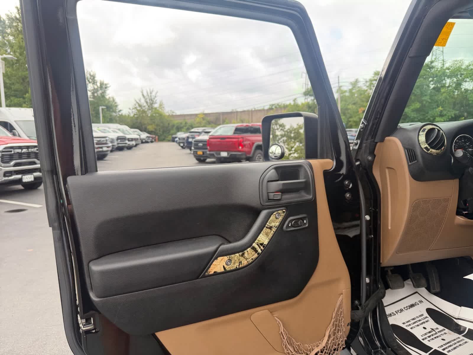 Used 2015 Black Clearcoat Jeep Sahara image 12
