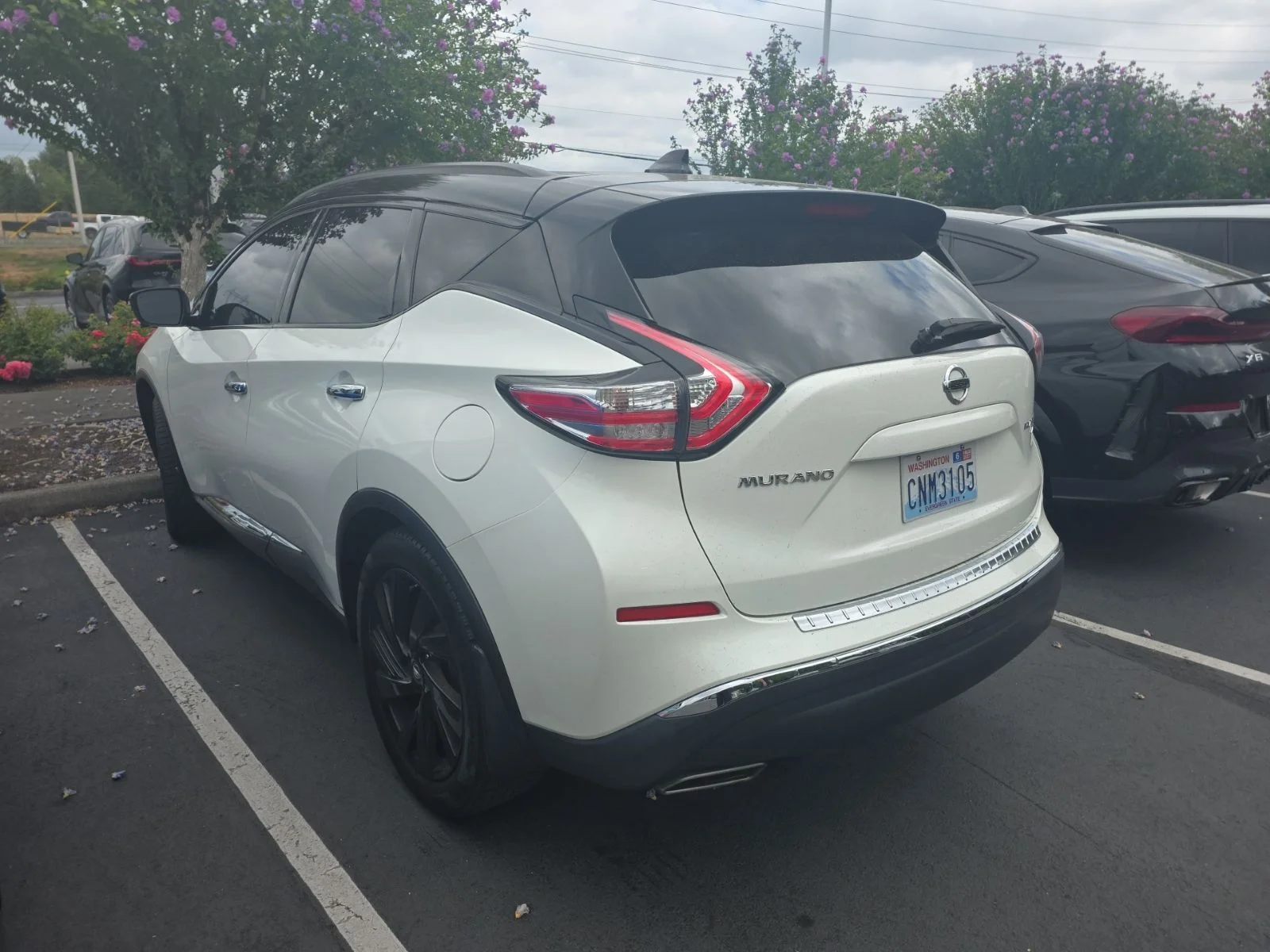 Used 2017 Pearl White Nissan Platinum image 2