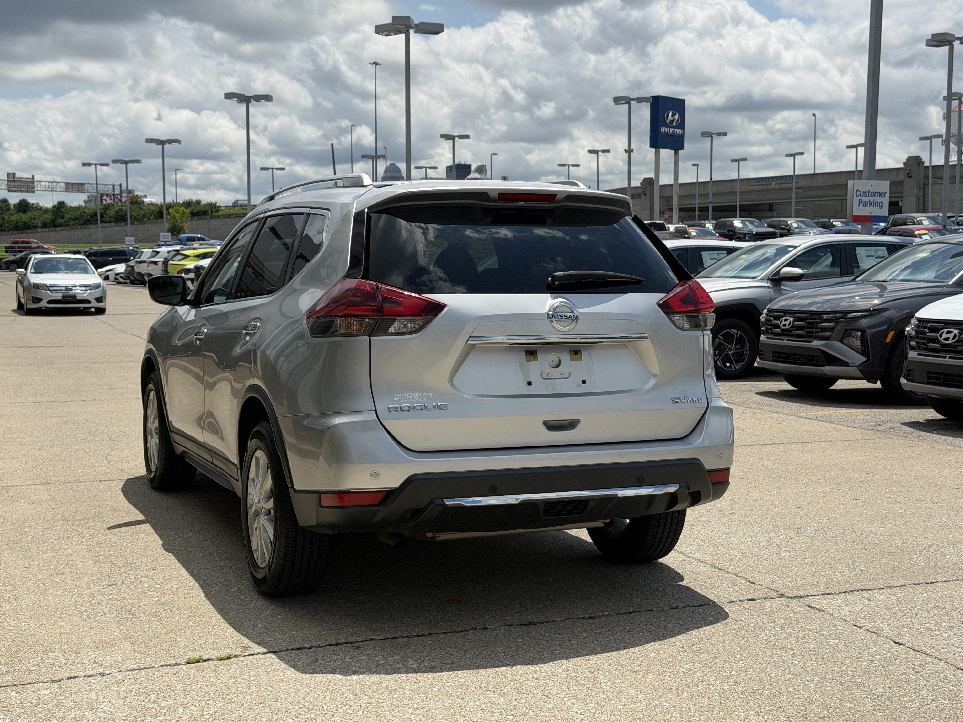 Used 2019 Brilliant Silver Metallic Nissan SV image 7
