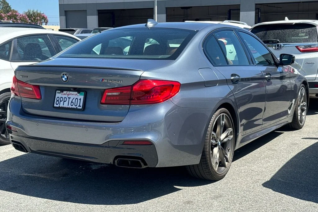 Used 2020 Bluestone Metallic BMW M550i xDrive image 4