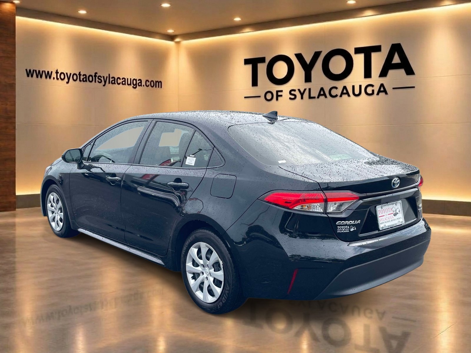 Used 2025 Midnight Black Metallic Toyota Hybrid LE image 4