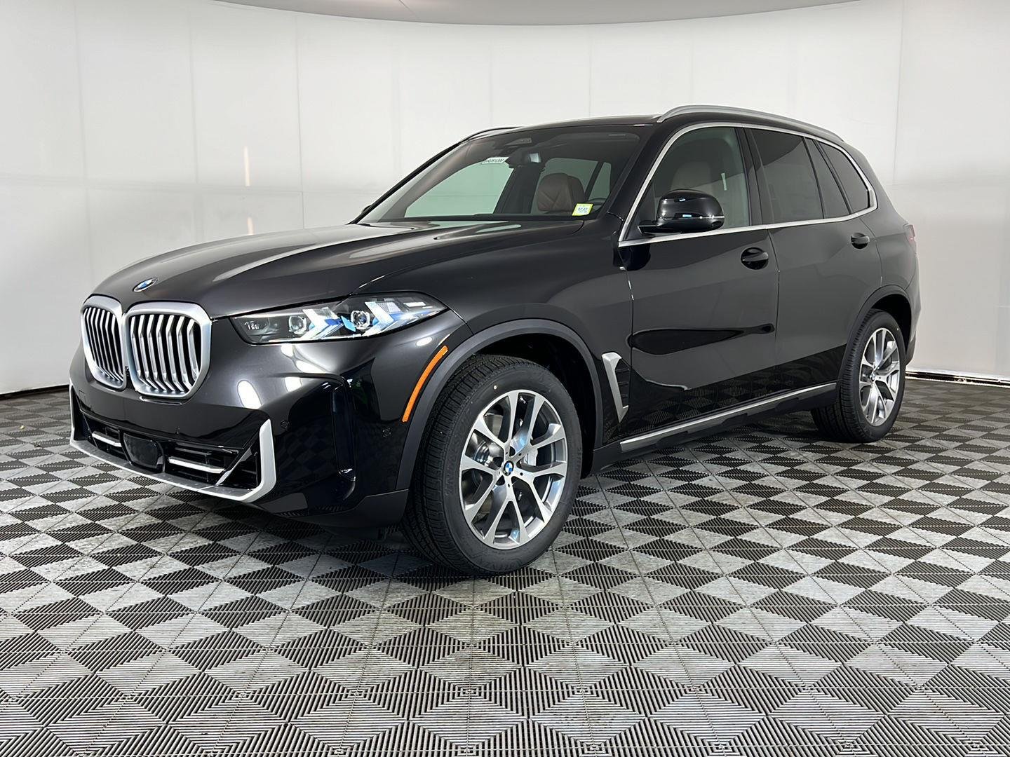 New 2026 Black Sapphire Metallic BMW xDrive40i image 17