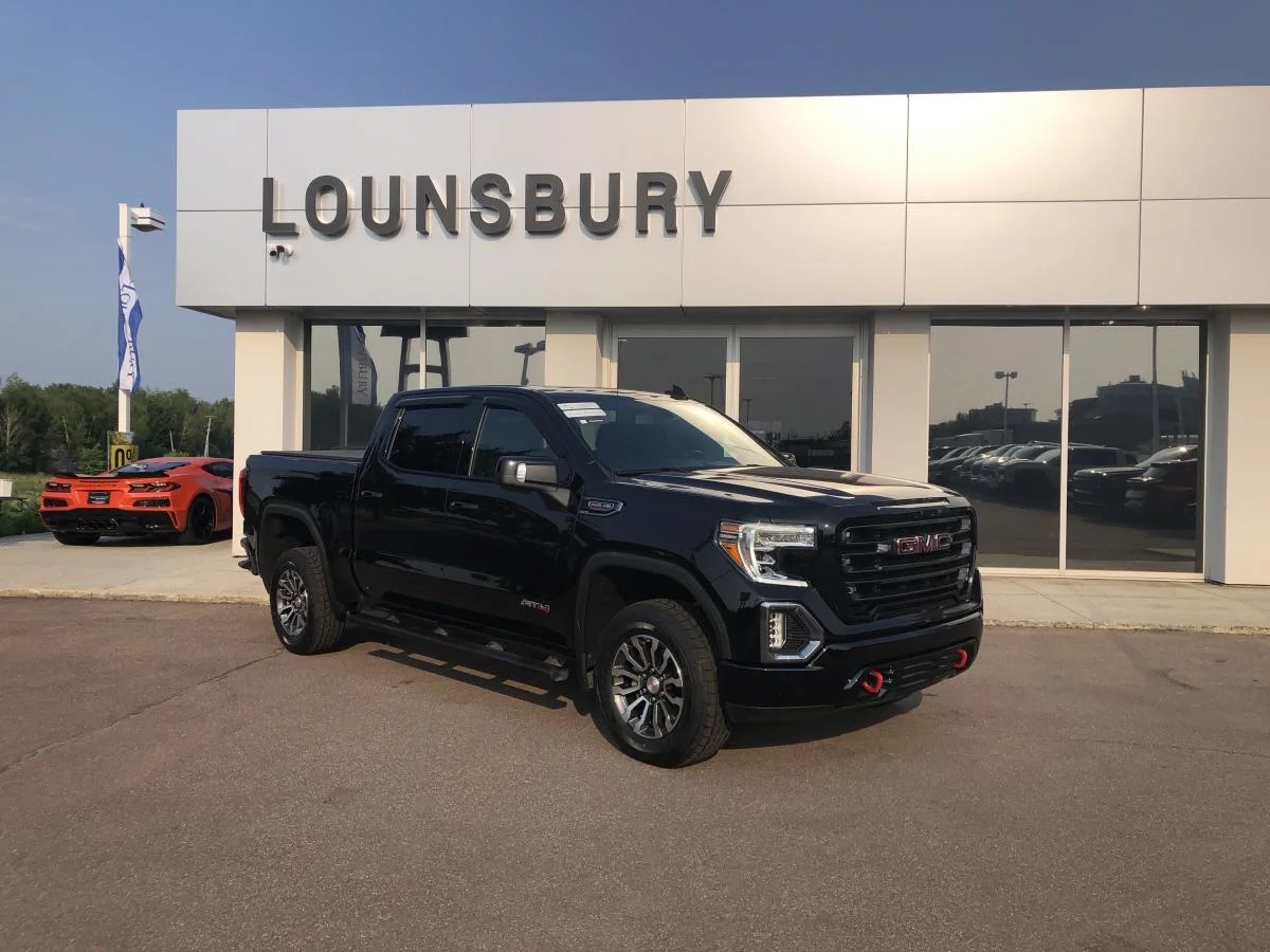 Used 2022 Black GMC 4WD Crew Cab 147" AT4 image 1